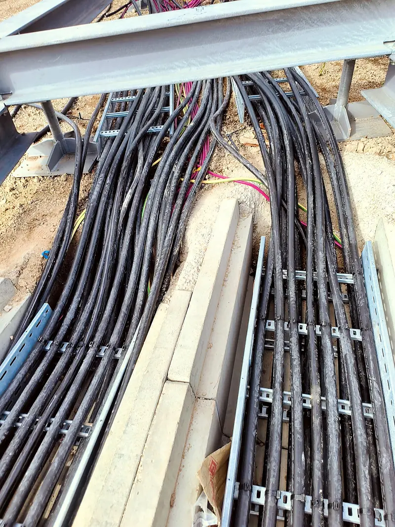 Cable installation in concrete troughs on an energy site