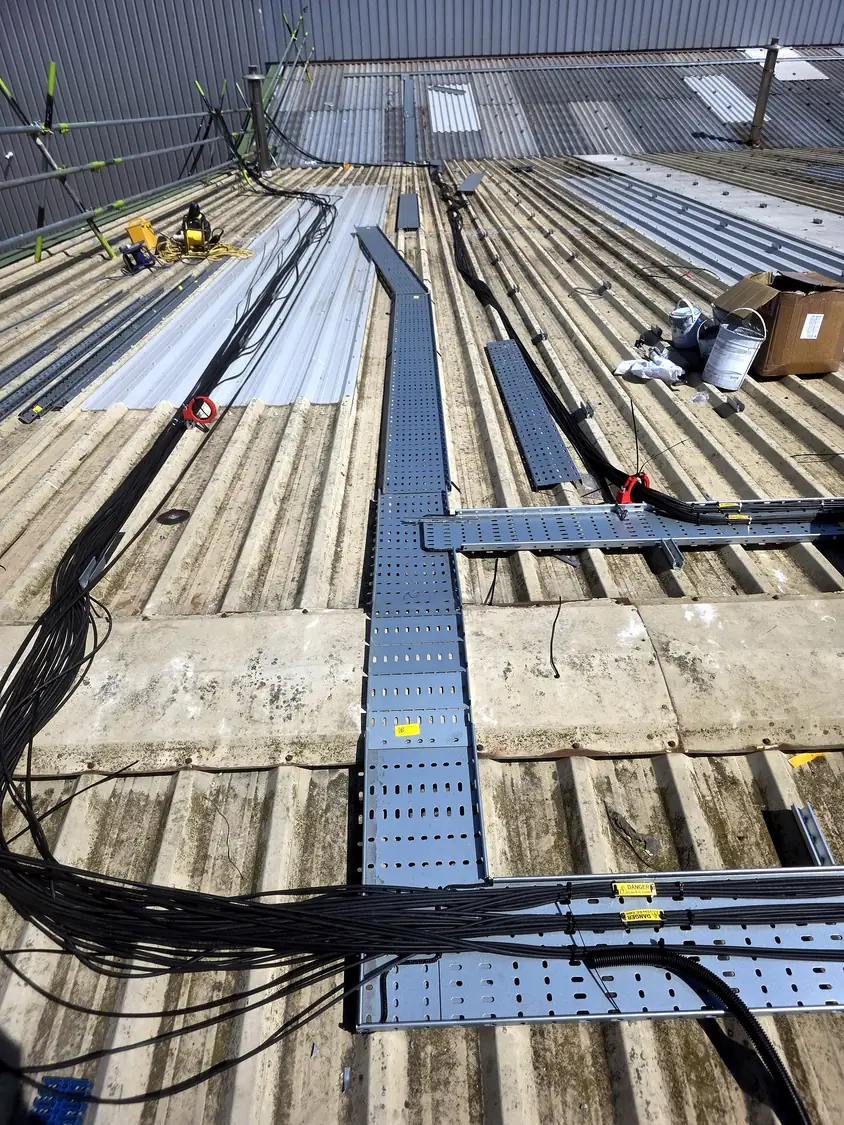 DC cables laid in tray across the roof