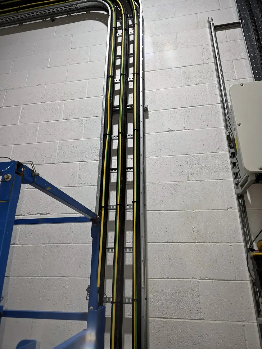Vertical cable drop on ladder rack