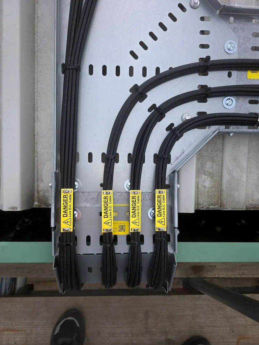 DC cables labelled “Danger – Live D.C. Cable”